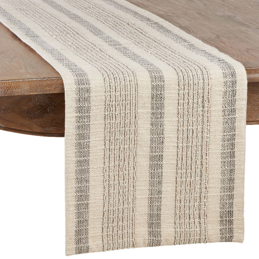 Textured table runner on a wooden table