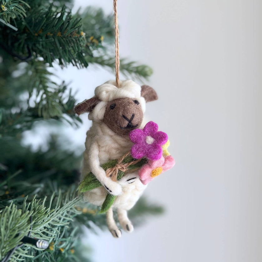 Felted sheep ornament with flowers 