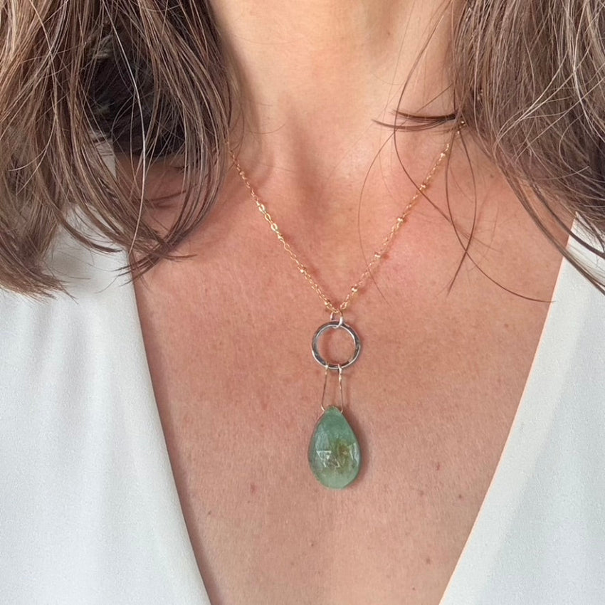 Necklace with a green pendant 
