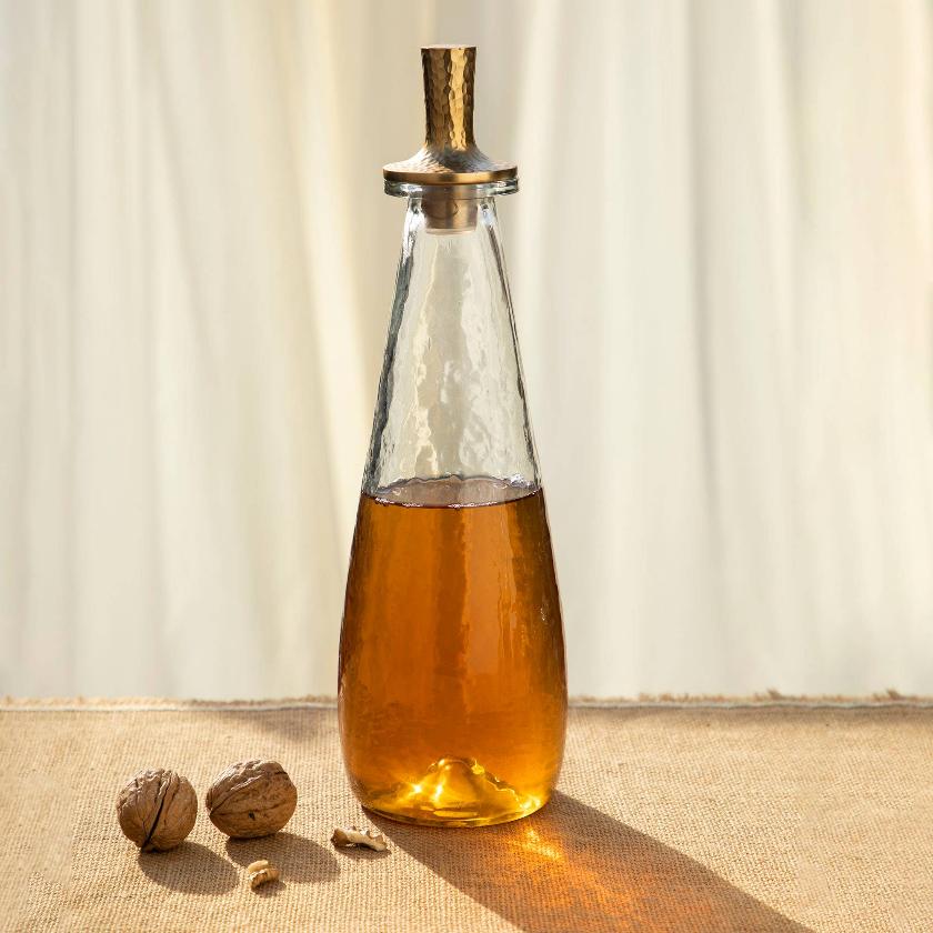 Pebble decanter with brass lid