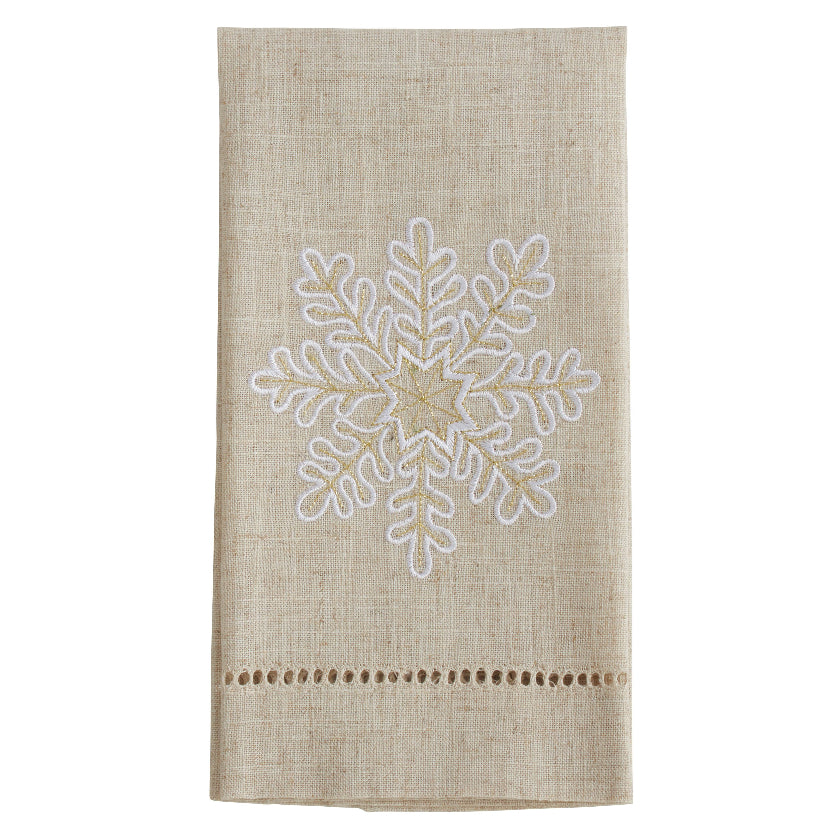 Textile with embroidered snowflake design 