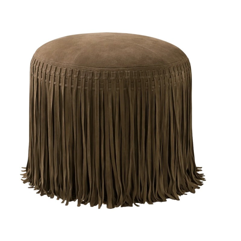 Brown suede round ottoman with long fringe detailing, a textural accent for living rooms, bedrooms and reading spaces.