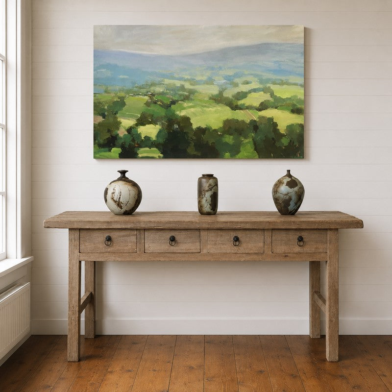 Handcrafted reclaimed wood console table with four drawers and iron ring pulls. A one-of-a-kind entryway, hallway, or sofa table rich in character and storage.
