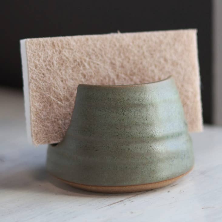 Gravesco Pottery moss green stoneware sponge holder, close up front view with felt-side sponge