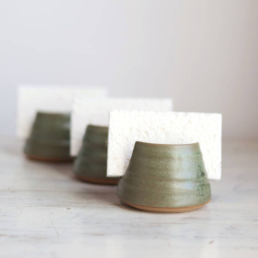 Three Gravesco Pottery moss green stoneware sponge holders with sponges, styled group shot