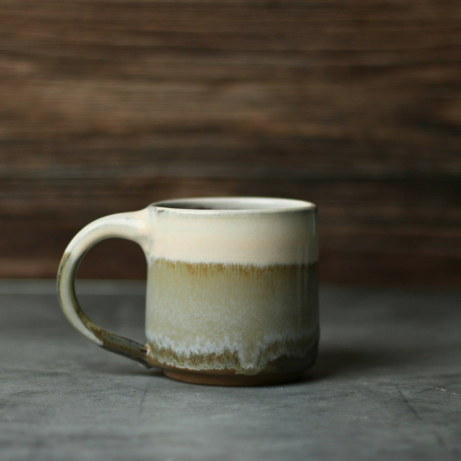 Jordan-Jean Ceramics handmade ceramic mug with reactive glaze, forest green bottom colorway