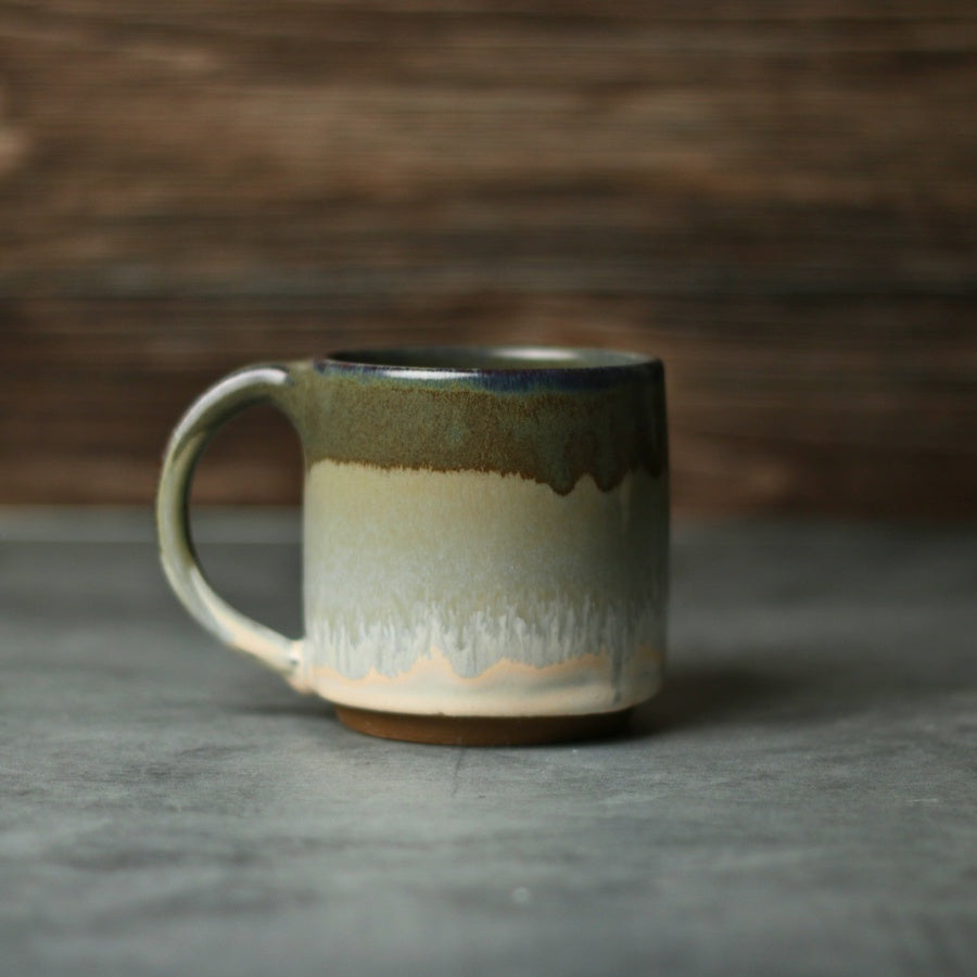 Jordan-Jean Ceramics handmade ceramic mug with reactive glaze, forest green top colorway