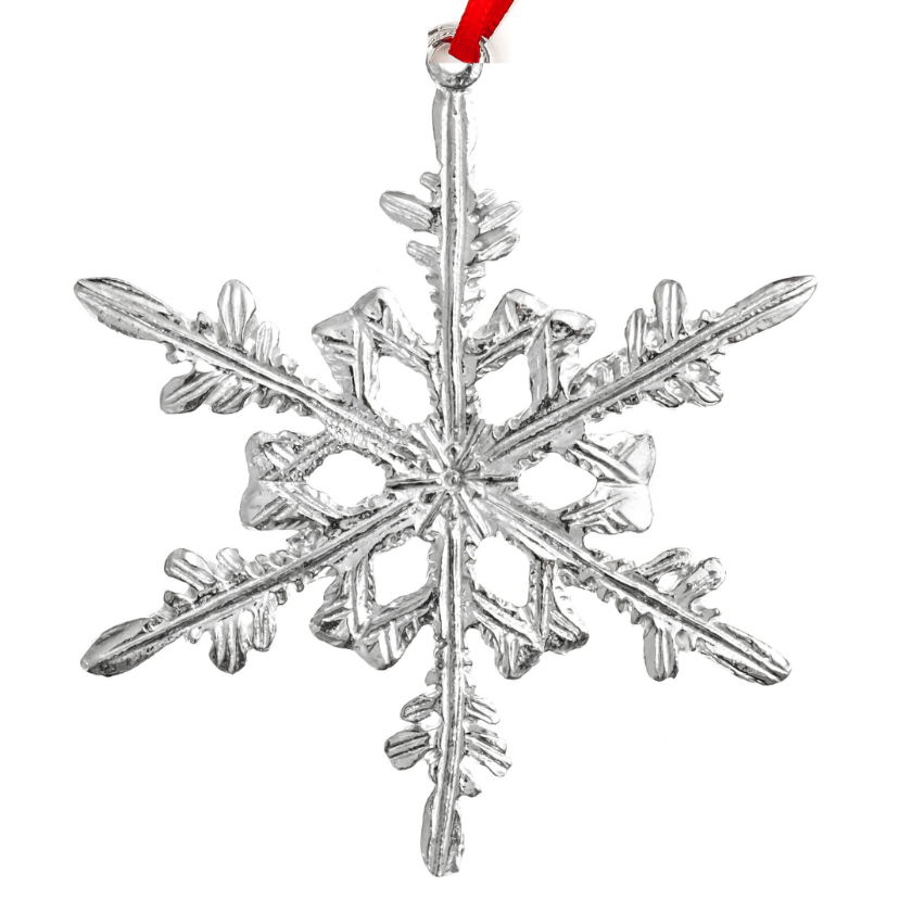 Silver snowflake ornament with a red ribbon on a white background
