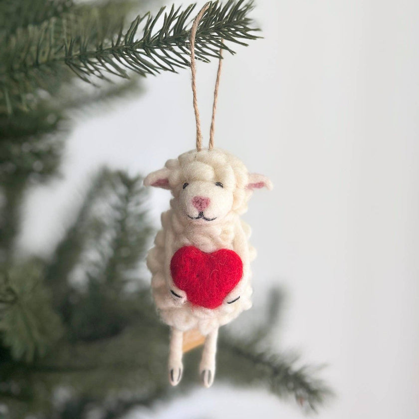 Decorative sheep ornament with a red heart 