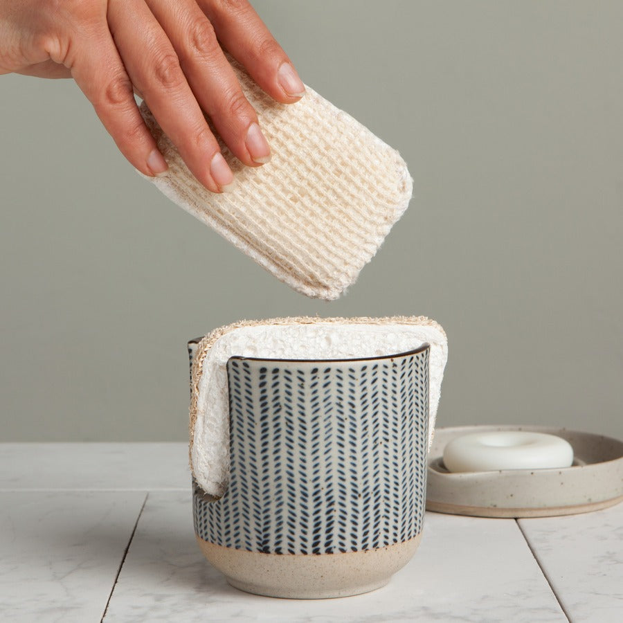 Herringbone stoneware sponge holder in use with natural cotton sponge and soap dish on marble surface | DaVallia Art & Interiors Chester Vermont