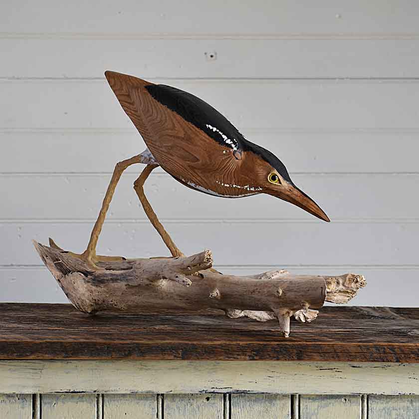 Hand-carved wooden bird sculpture by Wendy Lichtensteiger