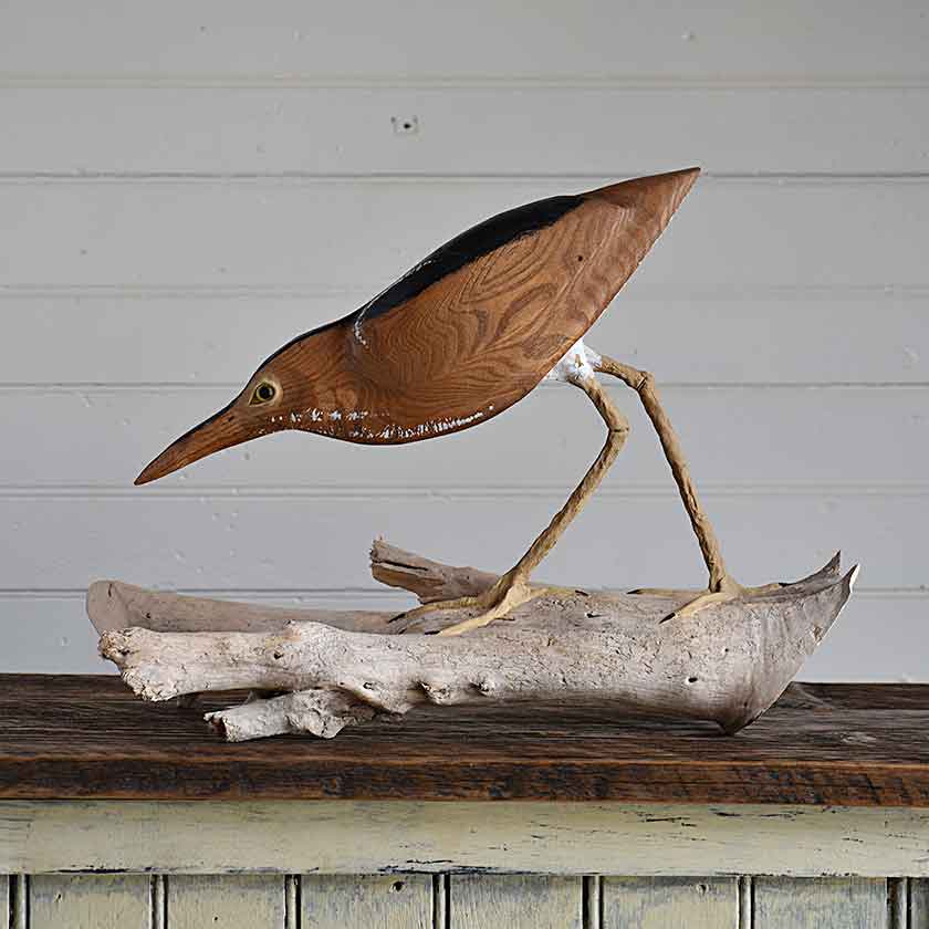 Hand-carved wooden bird sculpture by Wendy Lichtensteiger